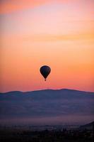 Bright hot air balloons in sky of Cappadocia, Turkey photo