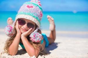 Portrait of adorable little girl on summer vacation photo