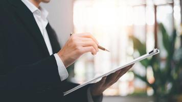 business accounting documents,auditor,management and auditing of office documents,Reports for Tax Time Analysis, Office worker working with documents, pre-approval quality assessment photo