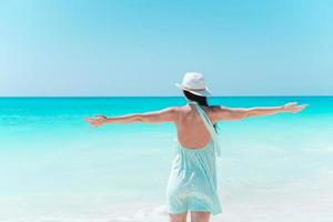 Young beautiful woman on beach vacation on Caribs photo