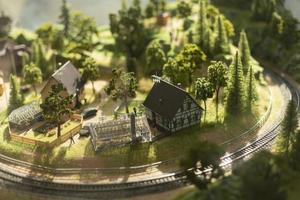 Toy Town. Model of village in mountains. Terrain model. Surroundings for railway. photo