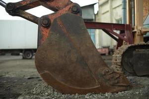 Steel excavator bucket. Machinery. Construction machinery in detail. photo