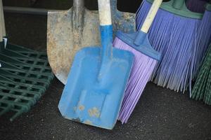 Broom for cleaning. Garden tools for leaf harvesting. Cleaning brushes. photo