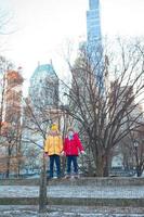Adorable little girls in Central Park at New York City photo