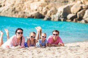 Young beautiful family on vacation photo