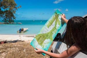 Young woman tourist enjoying on summer vacation photo