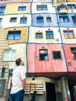 Hundertwasser house with a garden upstairs in Vienna, Austria photo