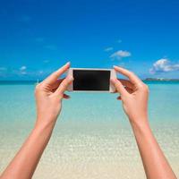 Close up phone background turquoise sea on wxotic resort photo