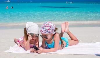 Little adorable girls during caribbean vacation photo