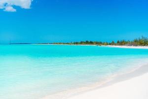 Perfect white sandy beach with turquoise water photo