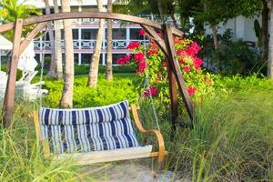 Summer swing in a beautiful luxury tropical hotel photo