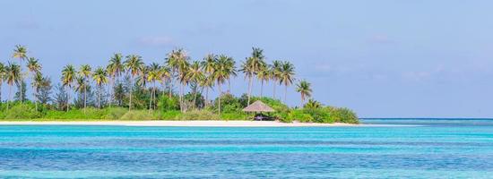 Perfect white beach with turquoise water at ideal island photo