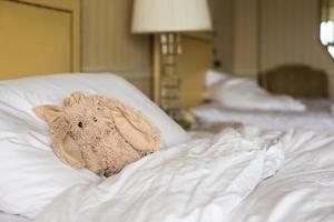 Room with bed and plush toy photo