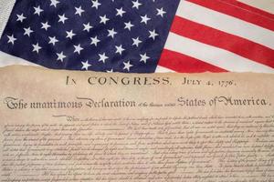 Declaration of independence 4th july 1776 on usa flag photo