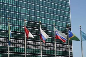flags outside united nations building in new york, 2022 photo
