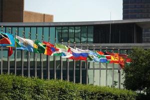 flags outside united nations building in new york, 2022 photo