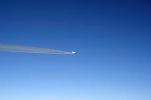 jet flying in the blue sky photo