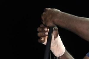 bandage hands of black Migrant detail on boat photo