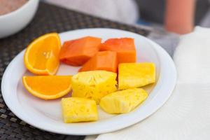 Healthy breakfast on the table closeup in outdoor cafe photo