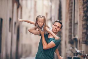 Happy dad and little adorable girl traveling in Rome, Italy photo