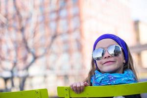 Adorable little girl enjoy sunny day on New York's High Line photo