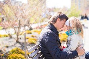 Adorable little girl and dad enjoy sunny day on New York's High Line photo