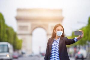 Beautiful woman on the Champs Elysees in Paris photo