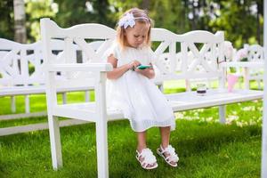 Adorable little girl at a wedding ceremony photo