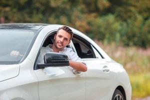 Young man tourist enjoying on summer vacation photo