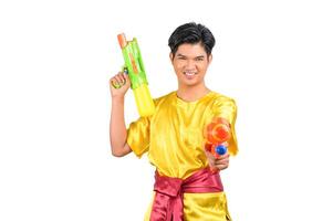 Portrait young man with water gun in Songkran Festival photo