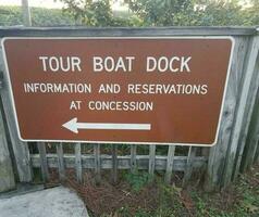 tour boat dock sign information and reservations photo