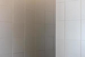 Texture of smooth wall tile. square  gray photo