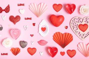 Many differente hearts and valentines day symbols elements top view. Creative valentines day flat lay background