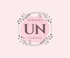 plantilla de logotipos de monograma de boda con letras iniciales de la ONU, plantillas florales y minimalistas modernas dibujadas a mano para tarjetas de invitación, guardar la fecha, identidad elegante. vector