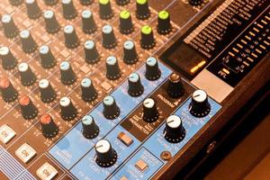 Close up scroll bar button control sound board mixer photo