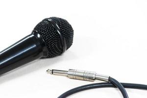 Close up microphone on white background photo