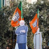 New Delhi, India - January 16 2023 - Prime Minister Narendra Modi cut out during BJP road show, the status of PM Modi while attending a big rally in the capital photo