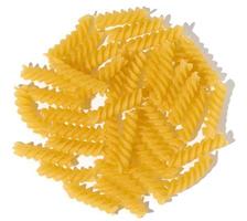 Raw wheat fusilli on a white isolated background, top view photo