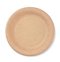 Empty brown disposable cardboard plate for food on a white isolated background photo