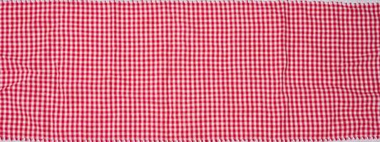 Cotton red-white kitchen towel, close up photo