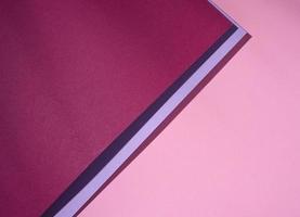 Modern pink background with sheets of paper with shadow. Template for business photo