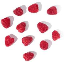 Ripe red raspberries on a white isolated background, top view photo