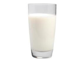 fresh milk in transparent glass on white background photo