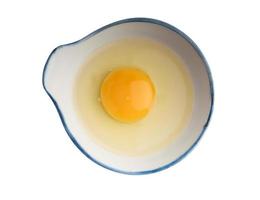 Cup of fresh eggs on a white background.Isolated image. photo