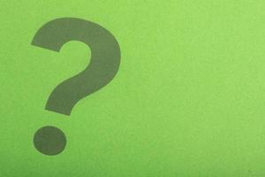 Question mark on green background.Thinking, solution, business, idea concept copy space. photo