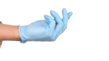 Doctor wears medical latex gloves, close up video