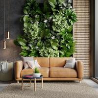 Living room wall mockup with leather sofa and decor on plants background.