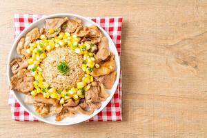 fried rice with pork sliced and corn photo