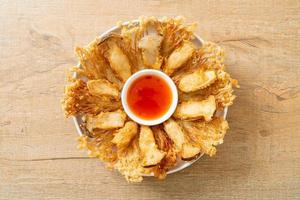 deep fried Enoki mushroom and King Oyster mushroom with spicy dipping sauce photo