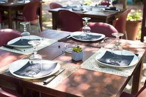 Served table set at outdoor cafe photo